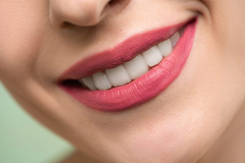 July Blog Woman With Pink Lipstick Smiling 3762453 Scaled E1595326972710